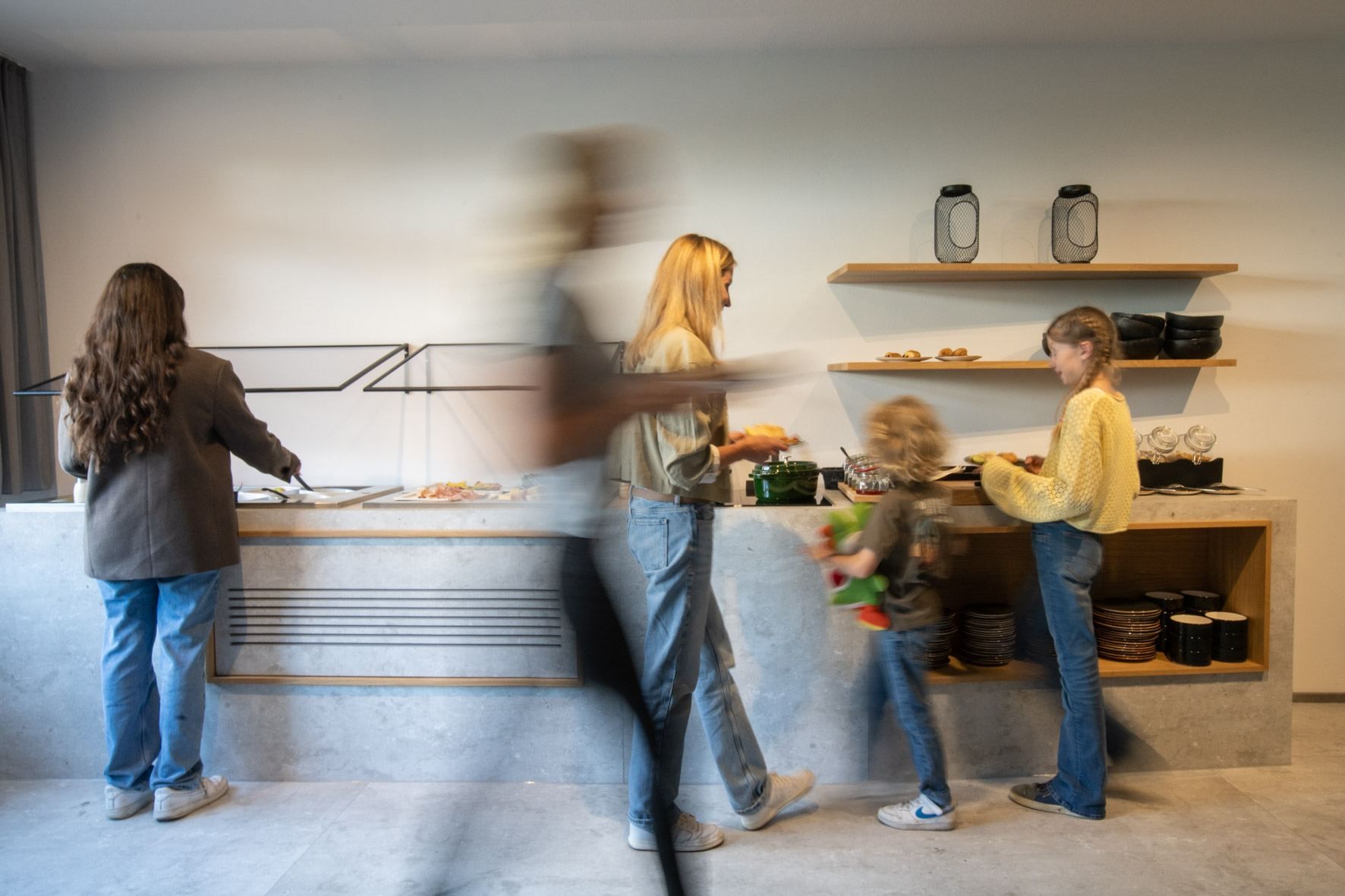 Guests at the breakfast buffet on the hotel’s ground floor
