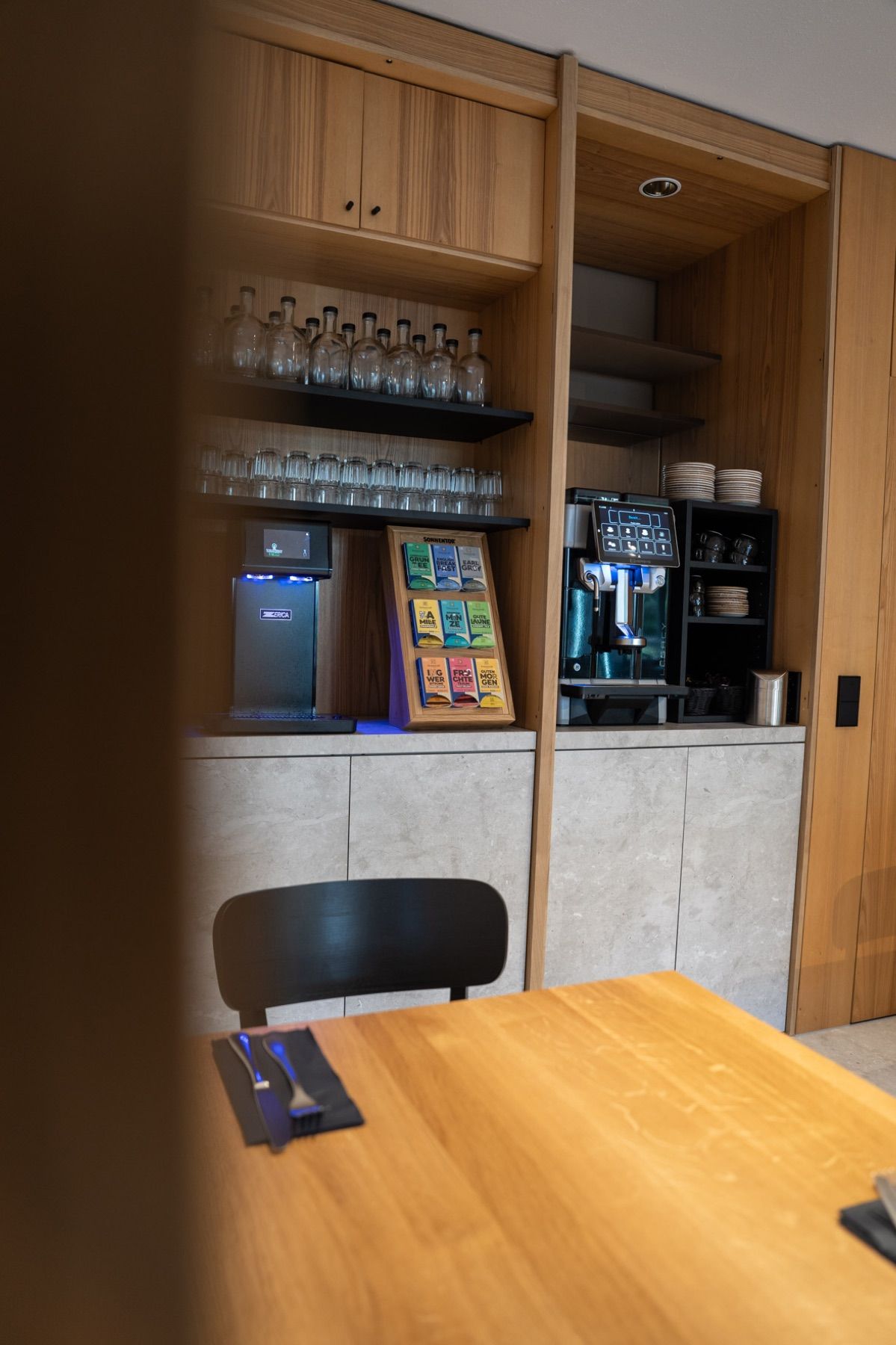 Barista coffee machine and water station in the lobby